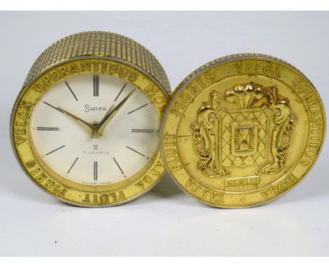 Swiza 7 Jewel Swiss made 8 day Clock alarm with Covert appearance with hinged top to look like a dressing table jar.   Runnin
