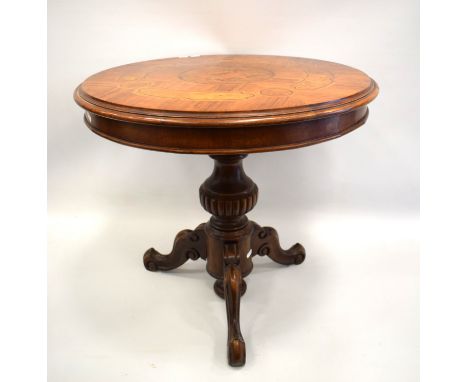 Reproduction Table on Tripod legs with marquetry inlay. Height 22 inches. See photos.   S2