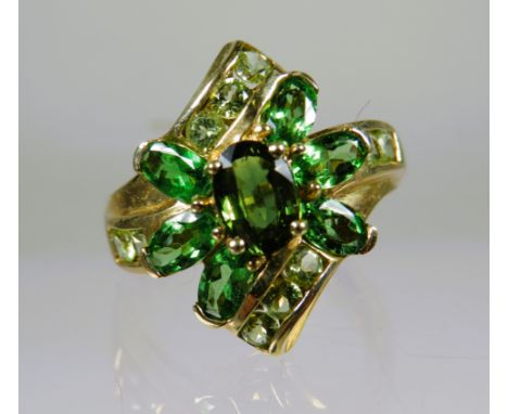 9ct Yellow Gold Ring set with Emerald coloured CZ in a Flower pattern.  Finger size 'P-5 to Q'   4.4g