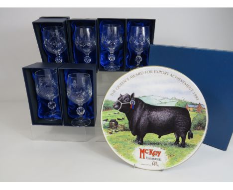 Six Crystal Goblets all boxed and unused plus a Royal Worcester plate showing a Prize Bull with Industrial motif. As new in b