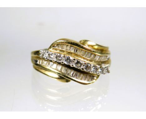 9ct Yellow Gold Diamond set Wave ring.  Finger size 'L'   3.0g with approx 0.30 pts of Diamonds.   