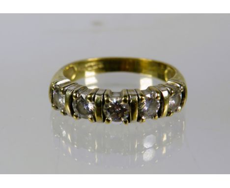 9ct Yellow Gold Half Eternity ring set with Five Diamonds which amount to approx 0.50pts.   Finger size 'L-5 to M'    3.8g