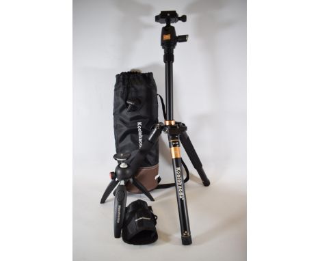 Two Tripods by Manfrotto plus one other . See photo