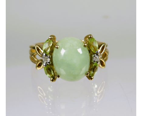 9ct Yellow Gold Ring set with an Oval Jade  (10 x 8mm) with Diamond and white Sapphire to each Shoulder.  Finger size L-5 to 