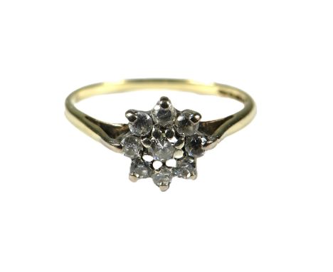 9ct Yellow Gold Diamond set ring in a flower pattern.   Finger size 'O'   1.4g
