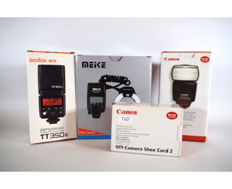 Four Camera Flashes by Canon, NEKE which fits Canon MK14 plus a Godox TT350. All Boxed. See photos. 