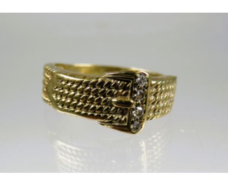 9ct Yellow Gold Buckle Ring set with Diamond chips to the Buckle.  Finger size K-5 to L      2.7g