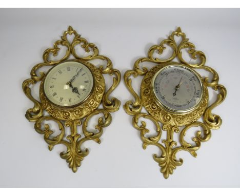 Ornate gilt metal wall mounted clock and matching barometer. 16.5" by 11"