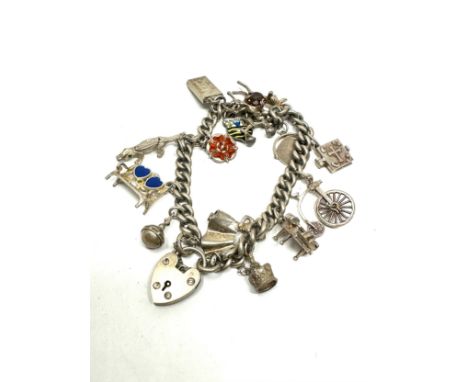 Silver charm bracelet with souvenir charms (52g)