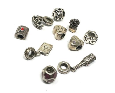 A collection of silver charms by designer Pandora (33g)
