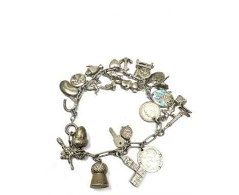 Silver charm bracelet with coin charm (52g)