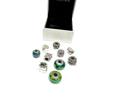 A collection of silver charms by designer Pandora (42g)