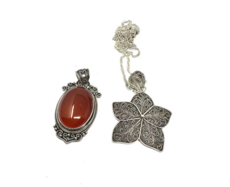 Two silver Suarti pendants with chain including Carnelian (34g)