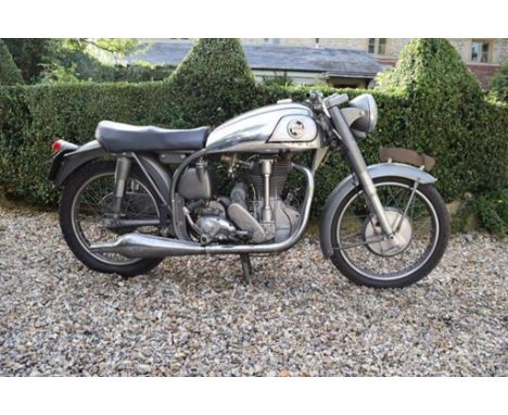A 1955 Norton International Model 30, registration number 912 XUX, polychromatic grey/chrome. This International Model 30 com