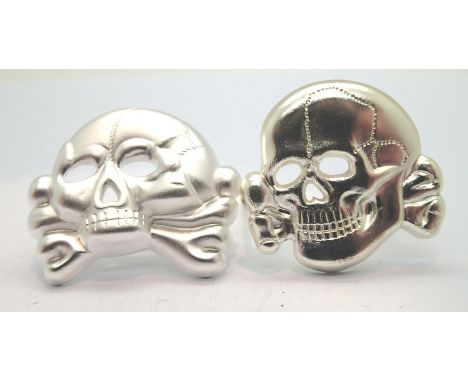 Two German WWII re-enactment SS Skull Head cap badges, jawless and Totenkopf. P&amp;P Group 1 (£14+VAT for the first lot and 