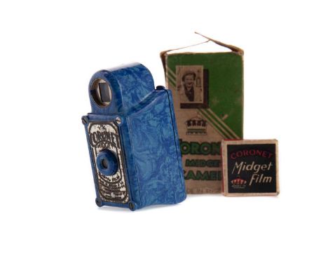 CORONET MIDGET CAMERA,in marbled blue, 6.5cm high, in original box with instructions and filmCondition report: There is a 'cr