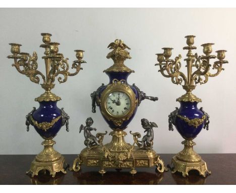 REPRODUCTION 'IMPERIAL' CLOCK GARNITURE,with two train eight day movement, striking on a bell, the white enamel dial with Rom