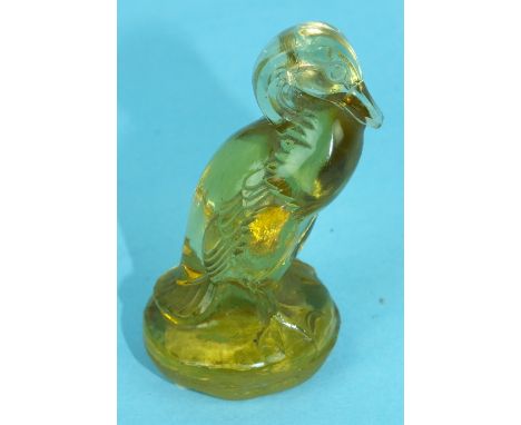 A René Lalique duck in clear yellow glass, acid etched 'R Lalique, Paris' to base, 7cm high.