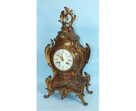 A 19th century French Boulle-work gilt-inlay-mounted mantel clock of balloon shape, the white enamel dial with numerals and s
