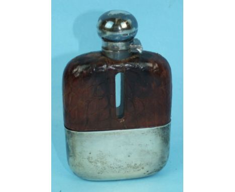 A silver and half crocodile skin covered hip flask, maker James Dixon & Sons, Sheffield 1923, 13cm.