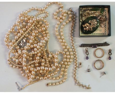 A silver bar brooch set amethyst and marcasite, a nephrite jade pendant with gold plated mounts and chain, a pair of similar 