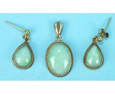 An oval jade pendant in 9ct gold rope-twist mount and a pair of matching earrings of teardrop form, total weight 4.3g.