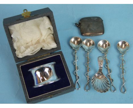 A Georgian silver caddy spoon with shell bowl, maker EM, London 1804, a cased silver napkin ring, marks rubbed, a silver Vest