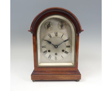A mahogany chiming and striking Mantle Clock, the silvered dial with Roman numerals, chime, silent, slow and fast subsidiary 