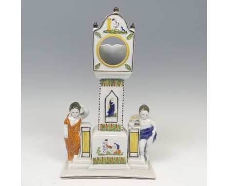 An early 19thC prattware Watch Stand, probably made in the North of the UK, with central longcase Clock, flanked either side 