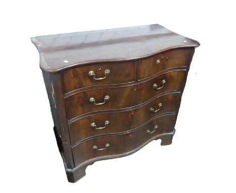 A Georgian flame mahogany serpentine front Chest of drawers, moulded serpentine top above two short beaded drawers and three 