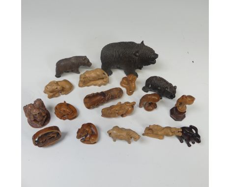 A Japanese carved Netsuke in the form of a Hare, signed, broken ear, together with thirteen other Japanese and Chinese carved