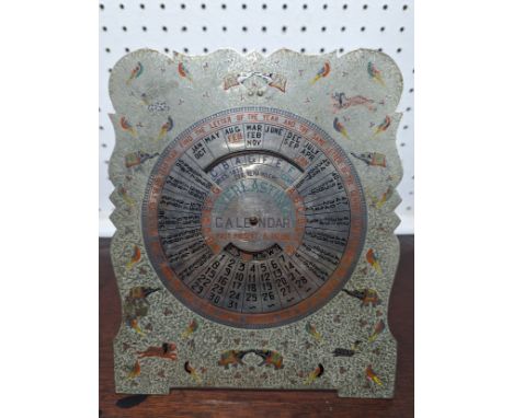 An antique engraved white metal and painted Perpetual 'Everlasting' Calendar, with metal easel back, W 18 cm x H 22 cm. 