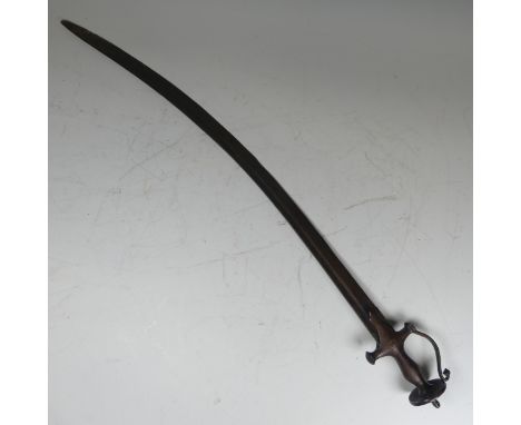 A 18th / 19th century Indian Tulwar Sword, with cruciform hilt and single edged curved blade, 90 cm.&nbsp; Note: This product