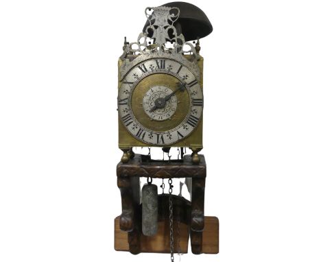 An antique late 17th century style Lantern Clock and Bracket, probably Victorian, silvered 6 inch chapter ring with roman num