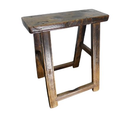 An 18th century elm milking Stool, raised on three canted legs, W 42 cm x H 42 cm x D 28 cm, together with an 18th/early 19th