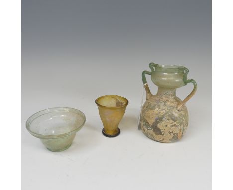 A Roman green glass twin-handled Flask, of bulbous form, H 14.5cm, together with a Roman glass Bowl and a Roman yellow glass 