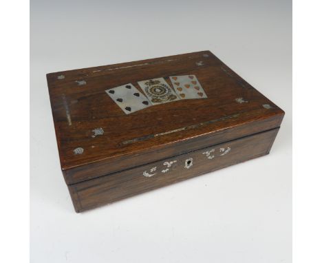 An antique mother of pearl inlaid playing card Box, hinged top inlaid with playing cards and decorative scrolls, complete wit