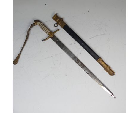 A reproduction George VI British&nbsp;naval inspired officers Dirk and scabbard,&nbsp;lion head pommel, the jaw with sword kn