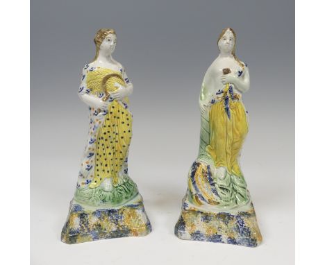 A matched pair of early 19thC prattware Figures, presumably each one of the Four Seasons, with spongued plinth base and decor