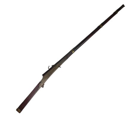 A 19th century matchlock Musket, the steel muzzle and barrel with brass straps, barrel stamped with Arabic, stock marked 'M60