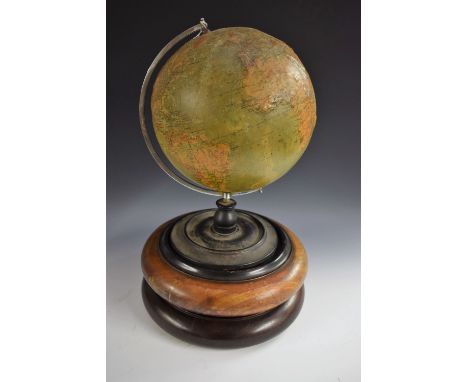 A 12" terrestrial globe, The Phillips' Relief Globe, by George Phillip & Son Ltd, London, the gores with raised contours, dra