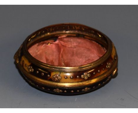 A George III tortoiseshell and gilt-metal pair case pocket watch case, decorated in brass pinwork with bands of stylized flor