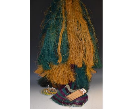 Tribal Art - grass skirts, combed in tones of green, purple and ochre, Papua New Guinea (2); a bag, strung and combed conform