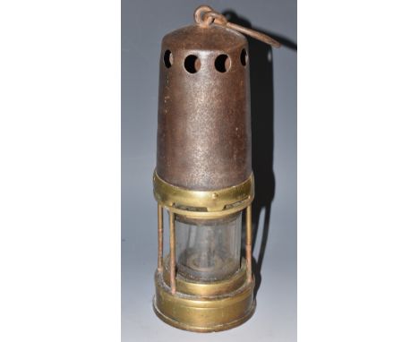A 19th century miner's lamp, the base numbered 320, 32cm high over handle