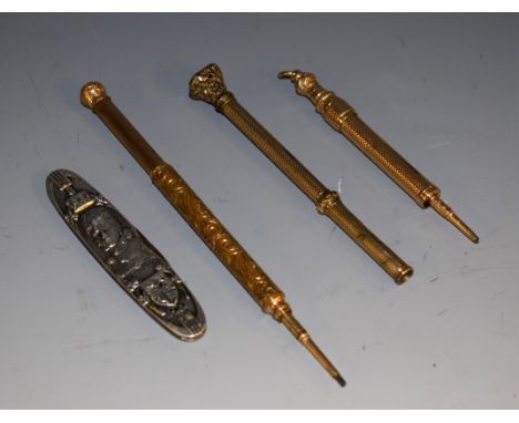 A Victorian yellow metal combination three-section pocket writing stylus, the engine-turned barrel with propelling pen nib by