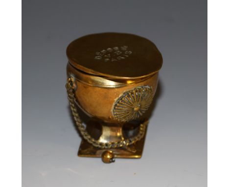 A late 19th century French brass novelty table vesta, as an uhlan helmet, hinged cover with striker to verso, 4.5cm high, mar