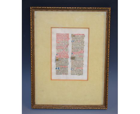 A late Medieval manuscript page, picked out in red, blue and gilt, 13cm x 9cm, c.15th century, framed