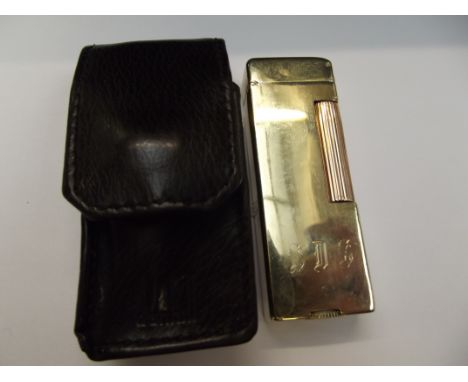 Dunhill 14ct gold cigarette lighter with case inscribed with initials S.D.S