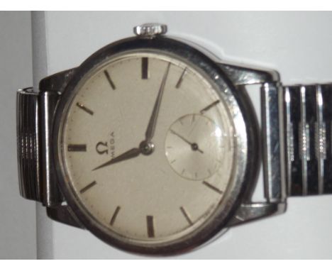 Omega manual wind wristwatch champagne dial with silver batons and hands dated 1959 inscribed on the back "H.BARKER 25 YEARS 