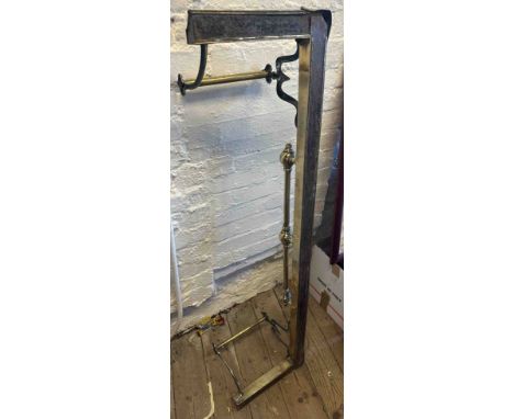 A 19th Century brass fire kerb fender with integral fire dogs and front rail